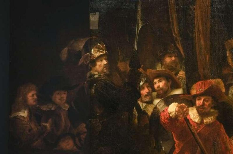 Detail of the Night Watch's left side, showing how Rembrandt's biggest painting just got bigger with the help of artificial intelligence in Amsterdam, Netherlands, Wednesday, June 23, 2021. The Dutch national museum and art gallery reveals findings from a