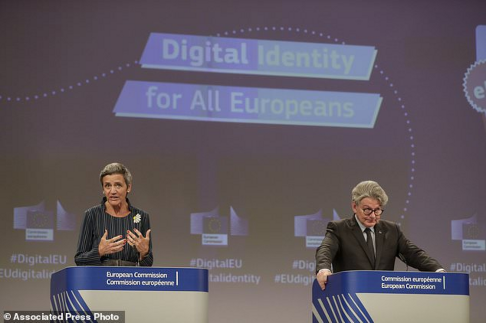 European Commissioner for Europe fit for the Digital Age Margrethe Vestager, left, and European Commissioner for Internal Market Thierry Breton participate in a media conference at EU headquarters in Brussels