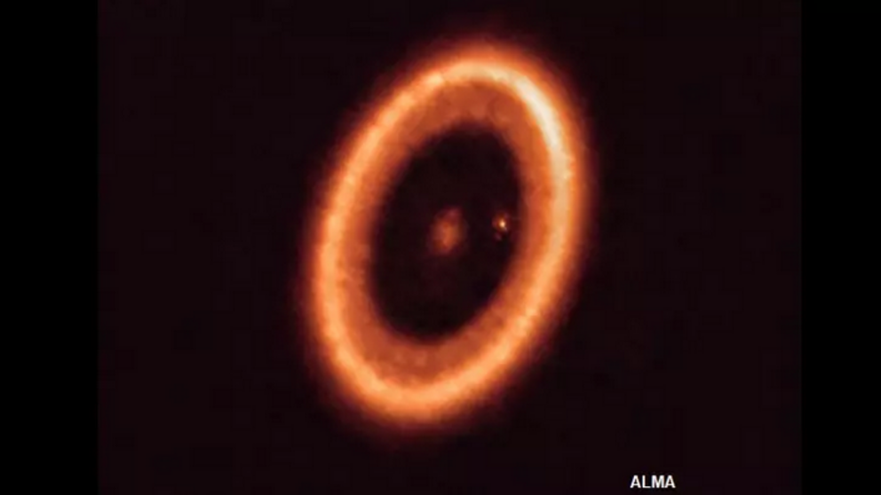 Previously unseen moon-forming disc photographed around exoplanet ...