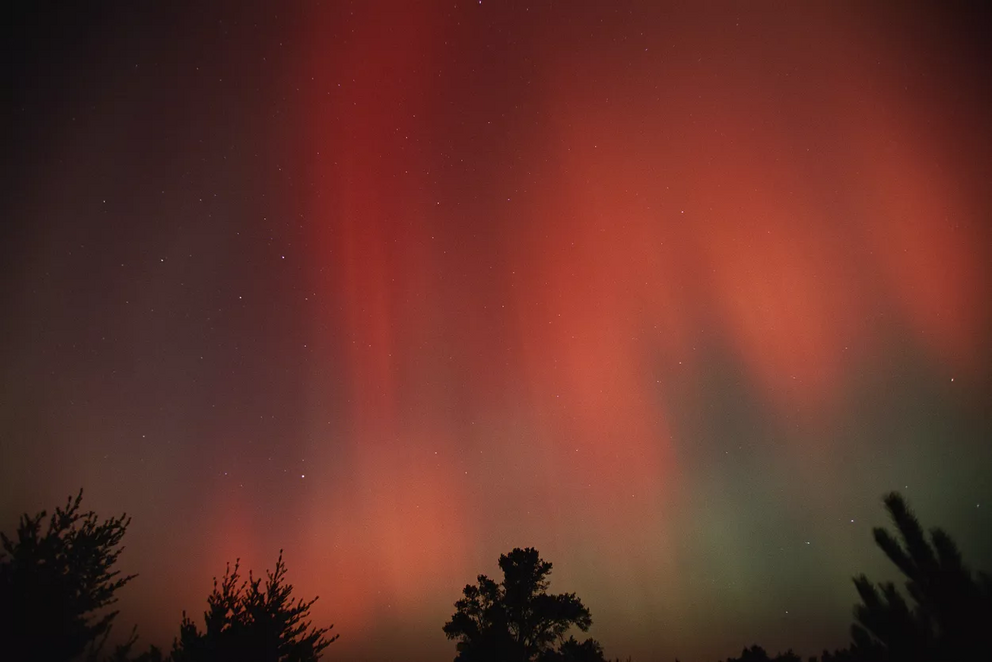 Red auroral displays are signs of particularly powerful solar storms.