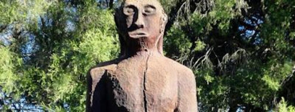 A yowie statue in a park in Australia