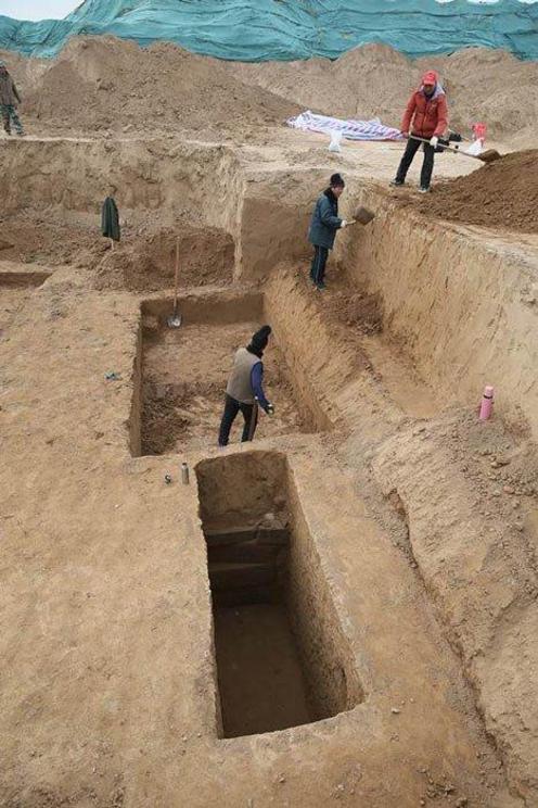 Chinese archaeologists working at the Warring States Period gravesite discovered in central China’s Sanmenxia City