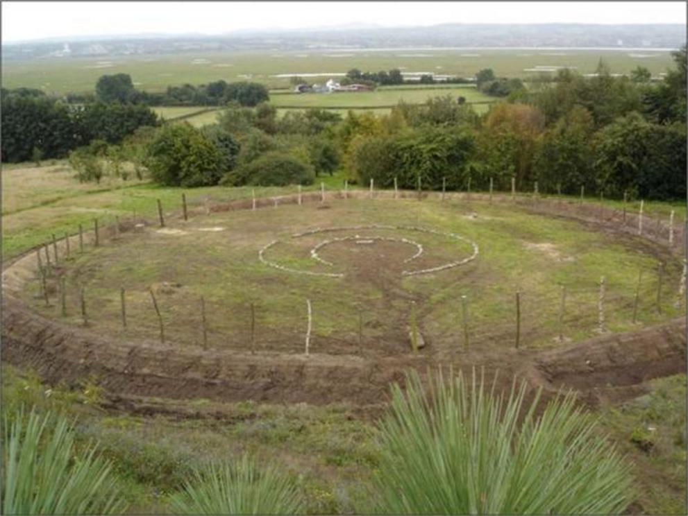 Figure 1. “Nesshenge” built by Dr Hill, a reconstruction of Stonehenge’s first henge-earthwork circa 3000 BC, which led to Dr Hill’s theory that a Scotsman from Aberdeenshire was a Stonehenge architect for the sarsen stones.