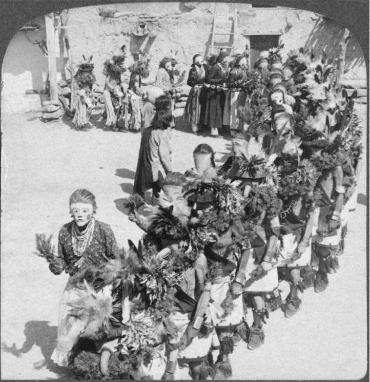 Kachina dancers, Shongopavi pueblo, Arizona, sometime before 1900.