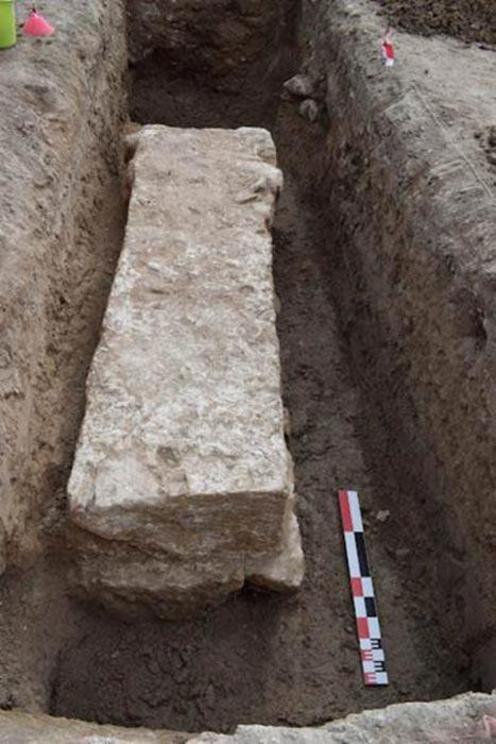 Pillar base framing the 7th ramp of the ancient Kition boatsheds to the east, viewed from the north.