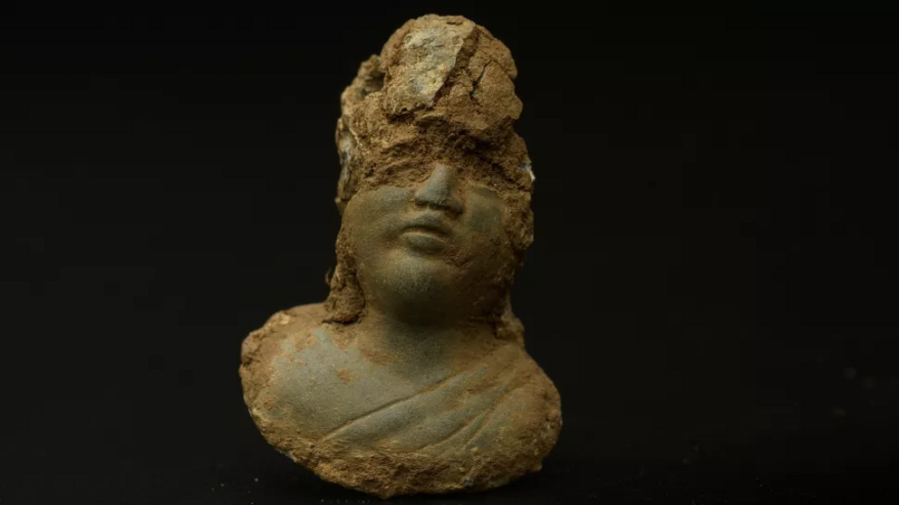 A Roman female deity scale weight uncovered during the archaeology excavation at Blackgrounds, Chipping Warden