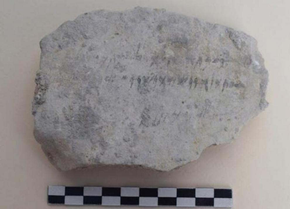 A limestone plaque with Phoenician writing was uncovered in archaeological digs this past year that took place, in part, under a former tennis court in Kition, Cyprus.