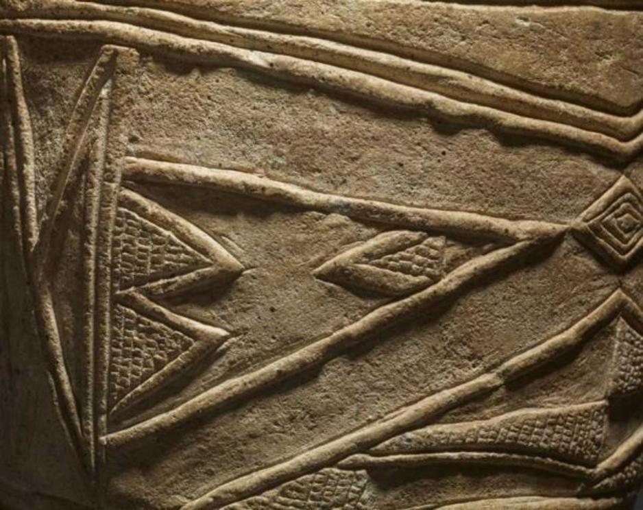 Abstract imagery found on the Neolithic drum sculpture.