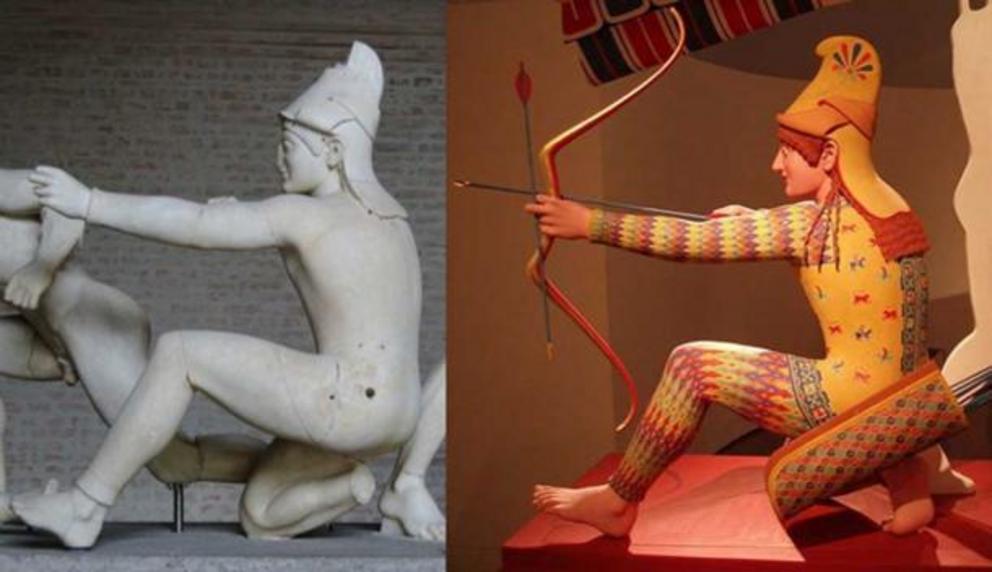 Right: Original Trojan archer (so called “Paris”), figure W-XI of the west pediment of the Temple of Aphaia, ca. 505–500 BC. Right: Polychrome reconstitution from the exhibition Bunte Götter.