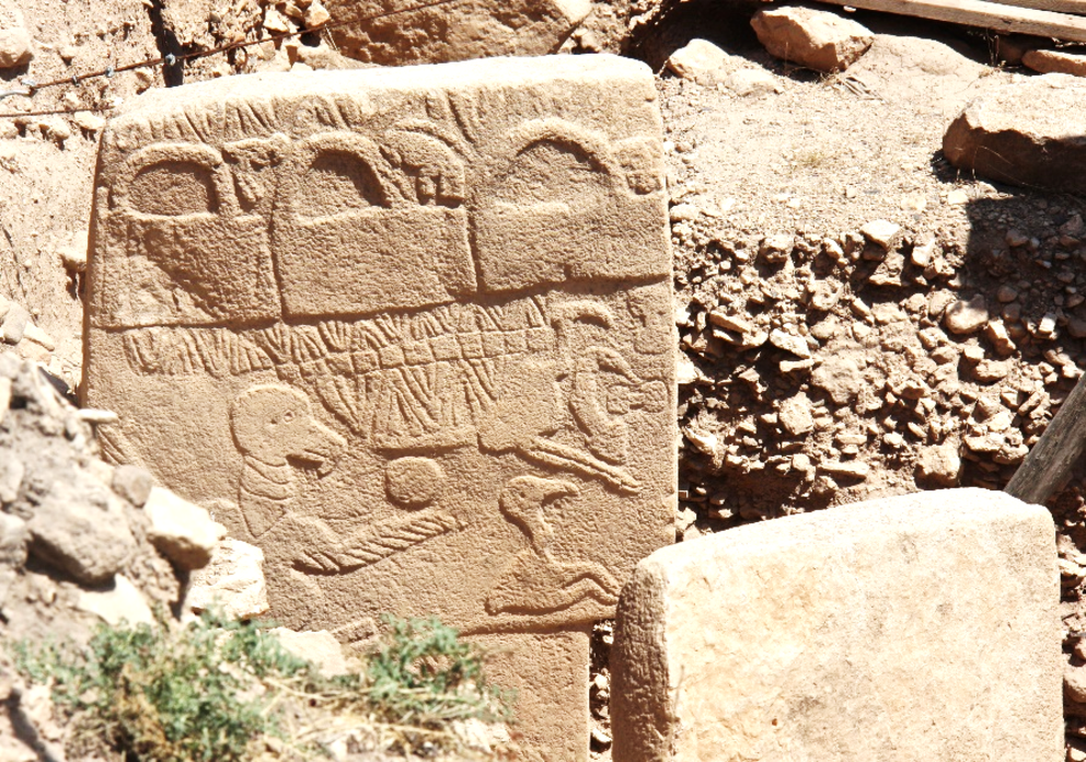 Figure 11: A row of ritual buckets (banduddu) depicted on Pillar 43 in Enclosure D, also known as the Vulture Stone of Gobekli Tepe, Turkey.