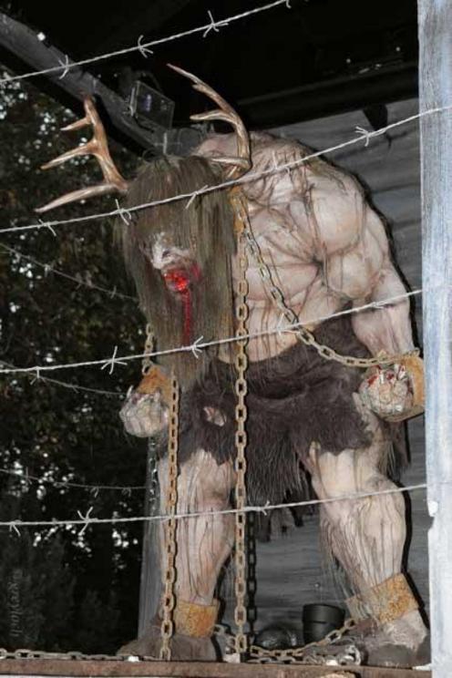 Depiction of a wendigo in a cage on display in “Wendigo Woods” in Busch Gardens Williamsburg.