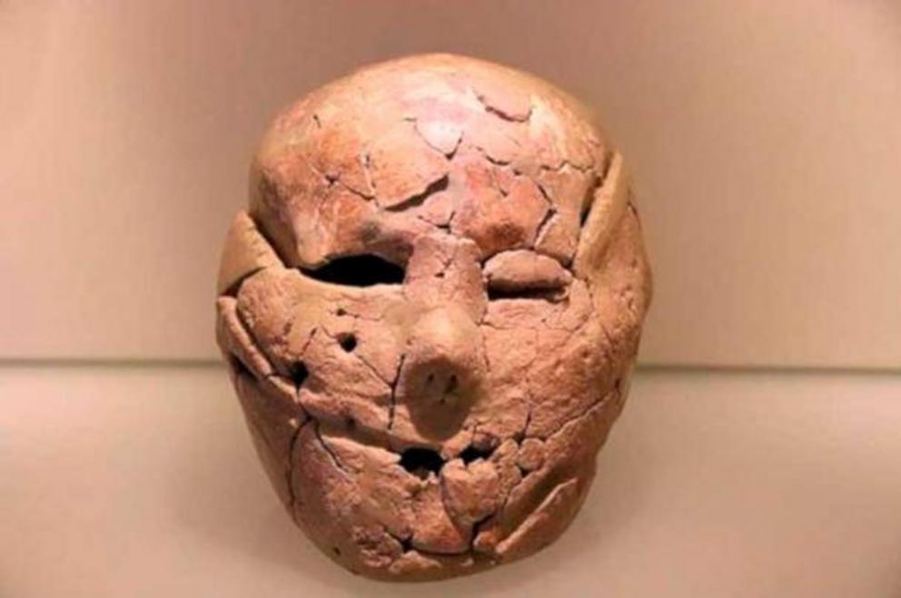 Plastered skull mask, c. 9000 BC, Israel Museum, Jerusalem. The  plastered skulls of Jericho  are the oldest funerary masks in the world. The skulls of their dead were removed and covered with plaster in order to create very life-like faces, complete with