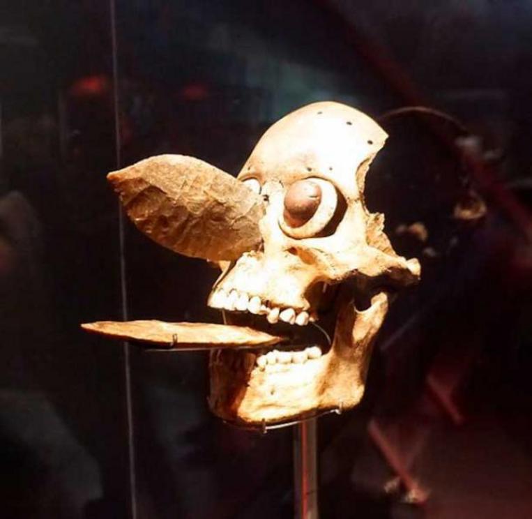 Skull mask from Templo Mayor in Tenochtitlan. It was made in the 15th century from the skull of a defeated elite warrior, two flint blades, sea shell, and pyrite. It was probably part of a ceremonial headdress or belt. Collection Museo del Templo Mayor, M