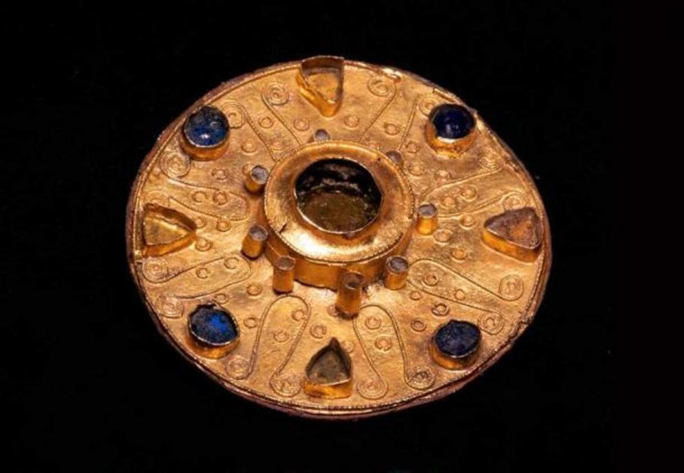 The beautiful gold brooch dates back about 1,400 years.