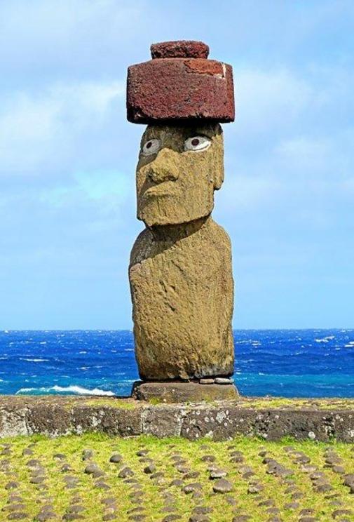 Ahu Ko Te Riku, in the Tahai complex, is the only ahu where visitors can see a complete 5.1 meter (16.7 ft) moai. It includes a replica red pukao hat and is the only moai with eyes, made of white coral and obsidian pupils and included in 1990. Archaeologi