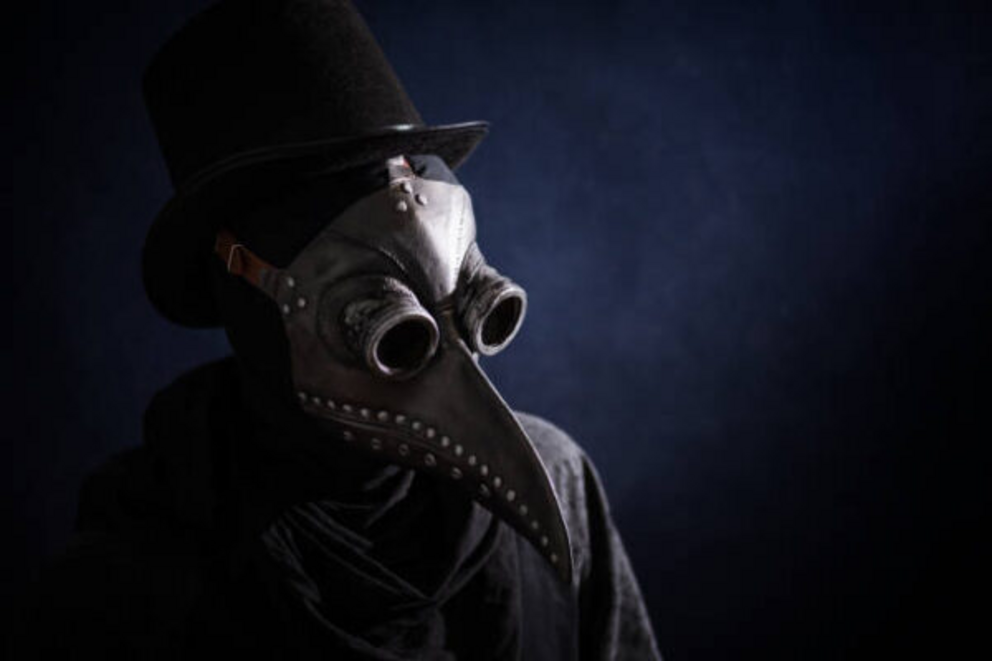 With bird mask and hat. Vintage style. Biohazard concept.