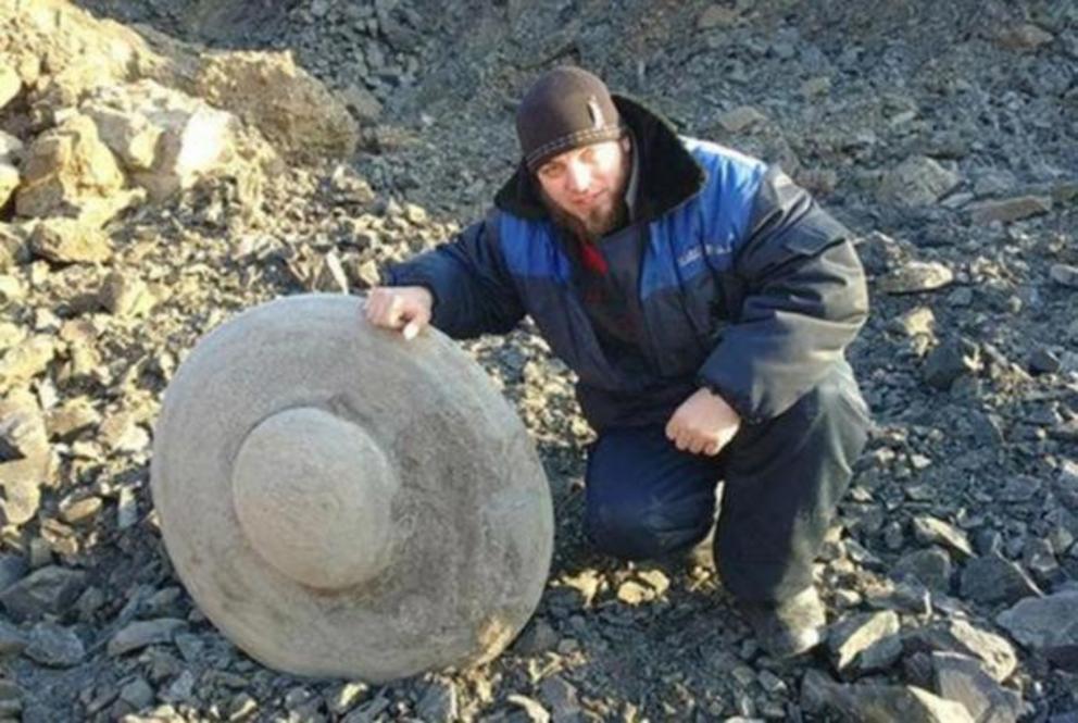 The disc-shaped object dug up in Russia by a coal mining company.