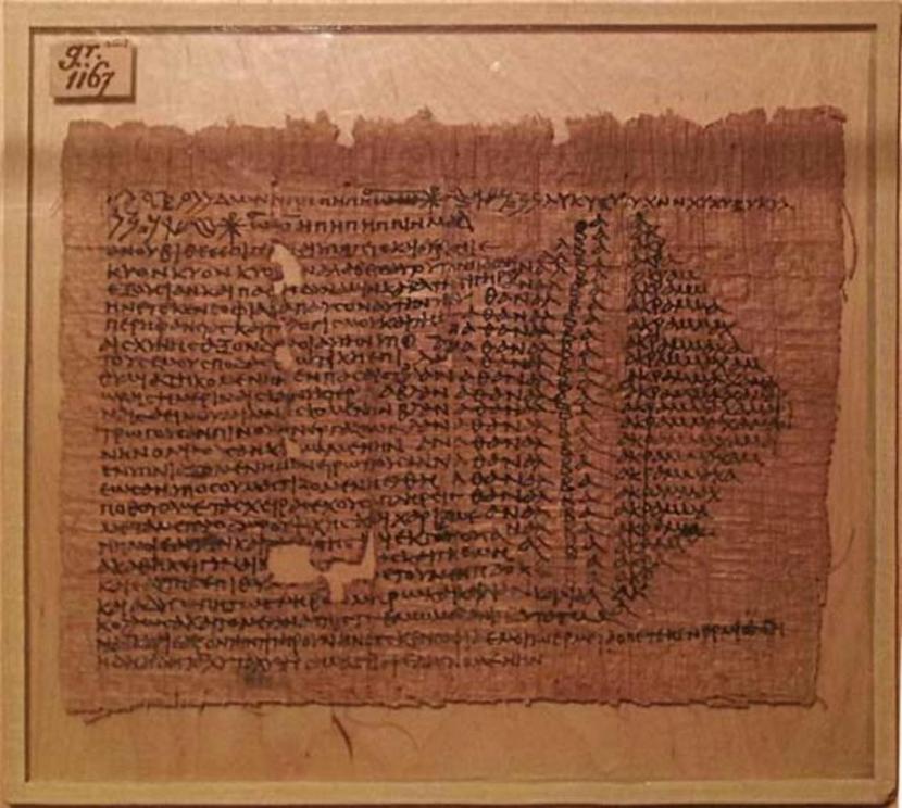 Greek magical papyrus with a love spell of attraction, addressed to the dog-headed god Anubis.