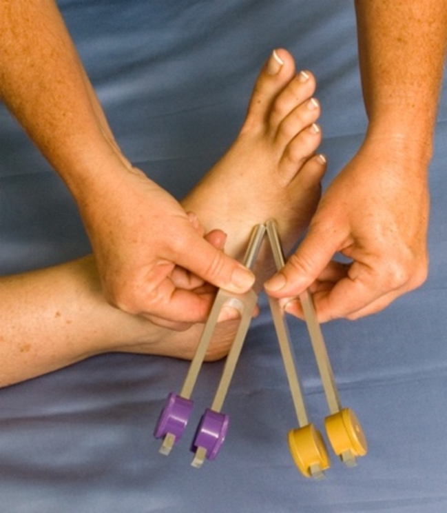 Sonopuncture, self-applied or practitioner-applied, by tuning forks