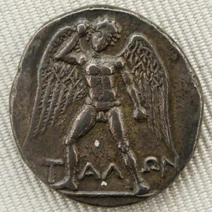 Depiction of the giant Talos god armed with a stone on the obverse of a silver didrachm from Phaistos, Crete, dating to circa 300 to 270 BC.
