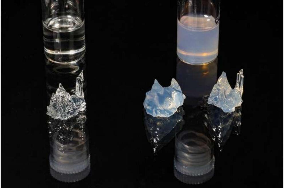 Three 3D-printed objects: one made from transparent resin (left); one from opaque resin, without correction (middle); and one from opaque resin, with correction (right).