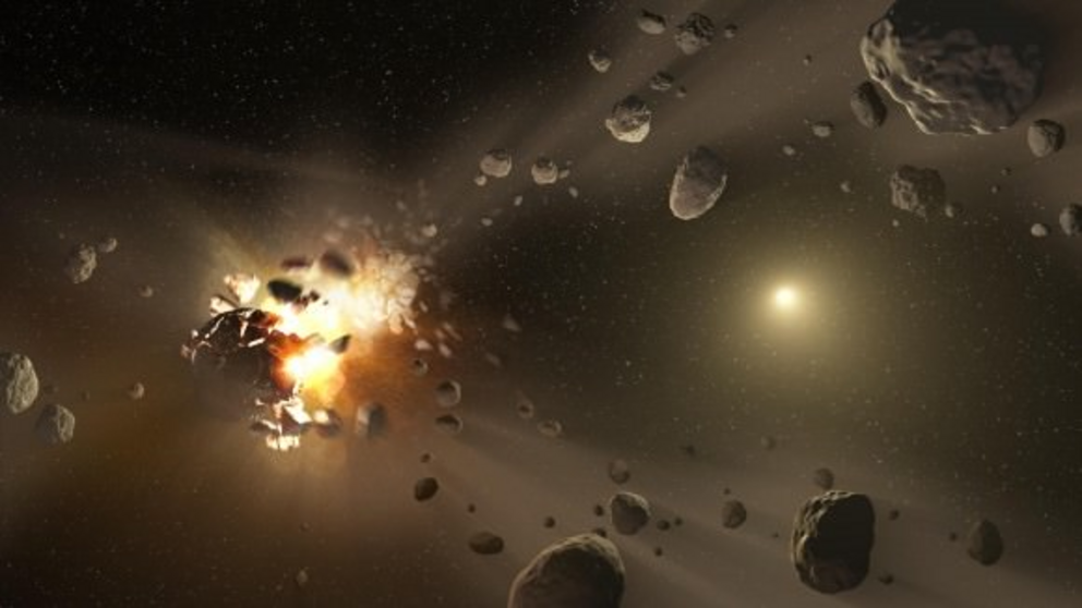 An artist’s conception of an asteroid collision in the belt between Mars and Jupiter.