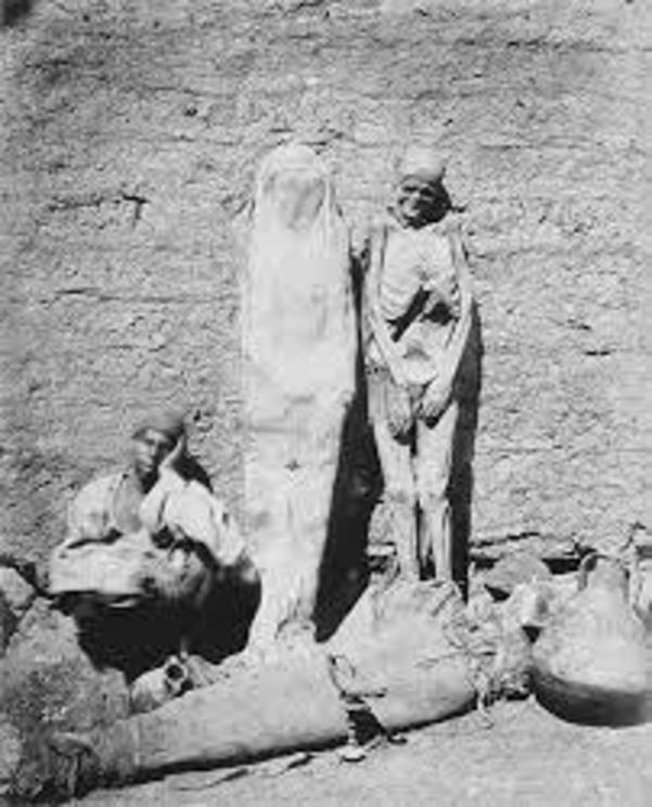 An Egyptian street mummy seller in 1875.