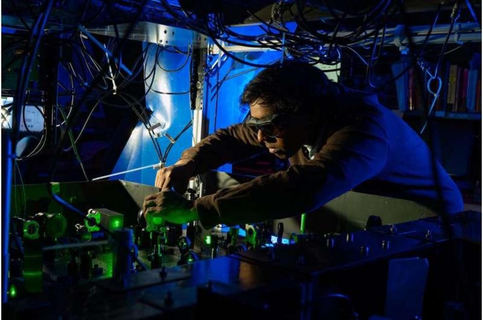 Rice University physicist Ruwan Senaratne and colleagues used laser cooling to build a quantum simulator where they could repeatedly view and photograph a quantum effect called spin-charge separation.