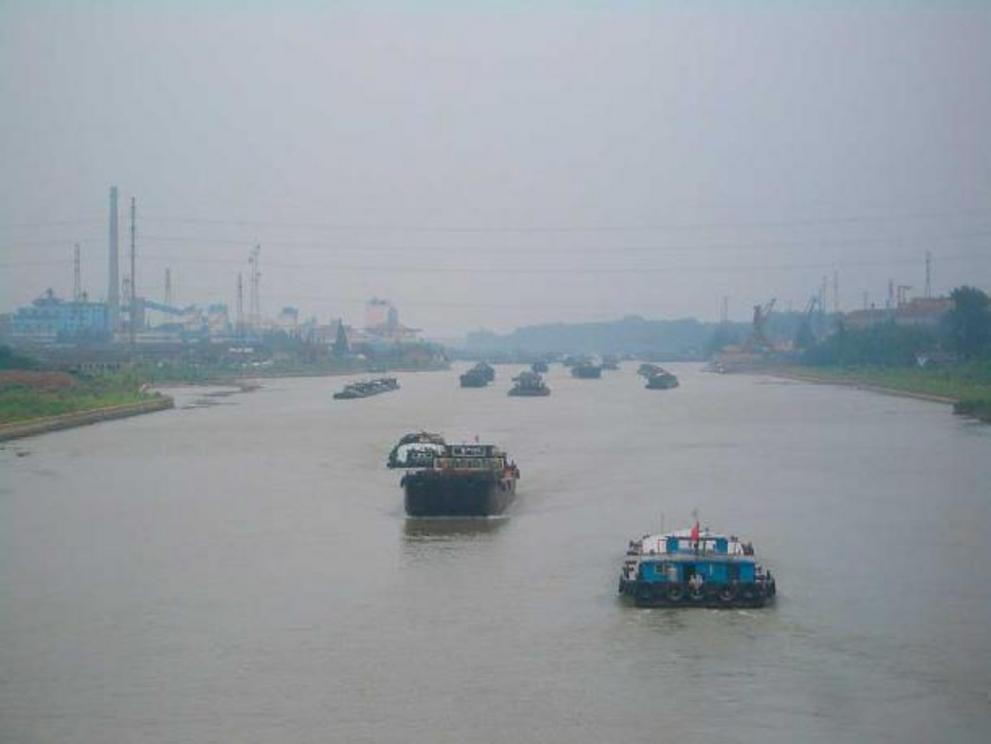 Barges on a modern section of China’s Grand Canal (the 