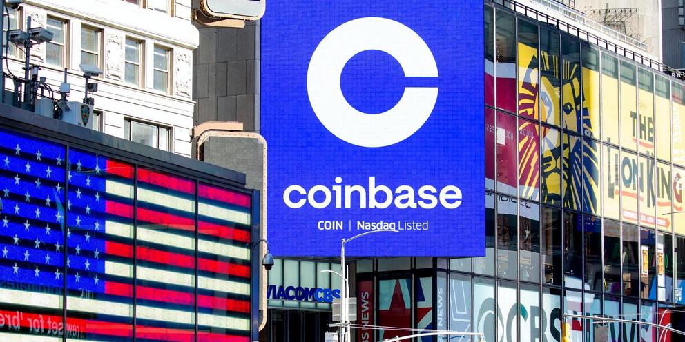 Monitors display Coinbase signage during the company’s initial public offering in New York City on April 14, 2021. Photo: Michael Nagle/Bloomberg via Getty Images