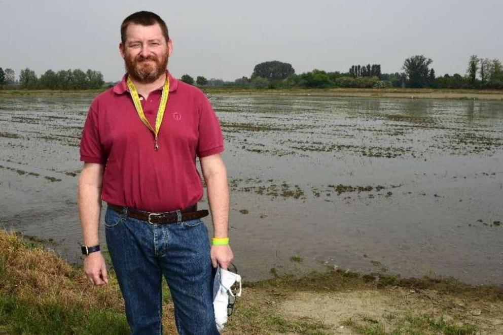 Stefano Greppi, head of Pavia's branch of the Coldiretti agricultural assocation, at a rice plantation in Lombardy during happier times for Italian farmers back in 2020.