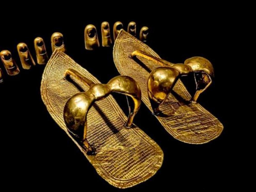 Gold sandals and toe covers discovered in King Tut’s tomb, part of “The Discovery of King Tut