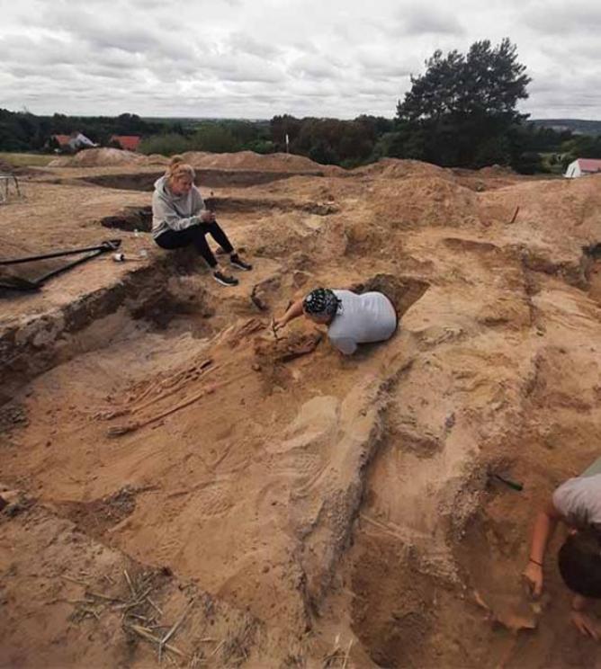 Archaeologists during excavations of the vampire grave discovered in Pien, Poland.