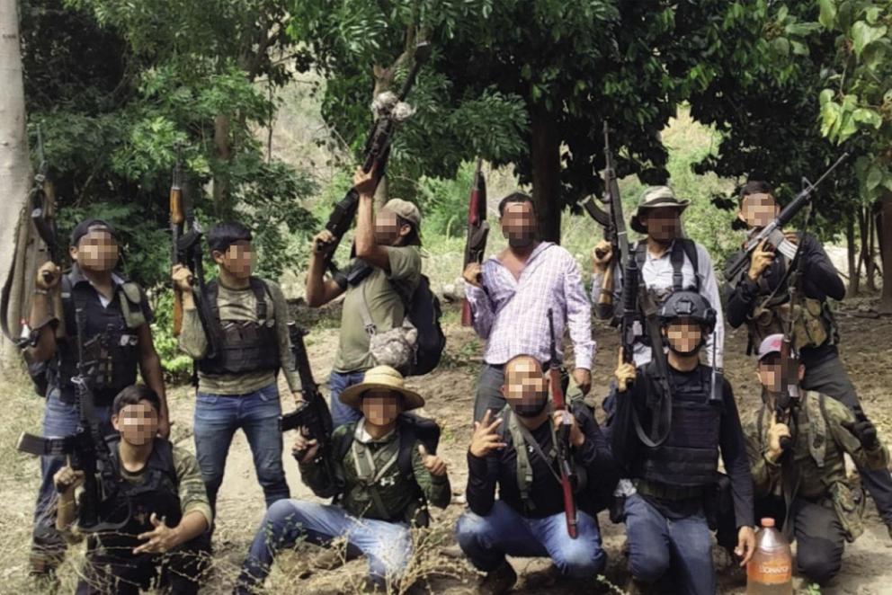 Members of the Sinaloa cartel in a photograph included in the book 'Sicario Warfare. - SICARIO WARFARE