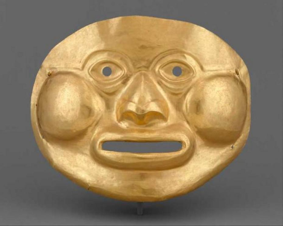 Funerary mask, 5th–1st century BC, Calima (Ilama), Colombia. Calima masks of the Ilama era are often flat, with generic details of the human face. On this example, the features are individualized with puffy bags beneath the eyes, a broad nose with flared 