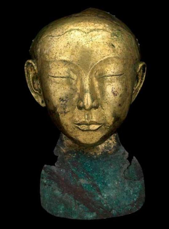 Funerary mask of a young woman from the semi-nomadic Khitans, the Liao dynasty (907-1125), China. The Liao often used gold or gilt bronze funerary masks in burials of important individuals. It is thought these masks were portraits of the deceased. 