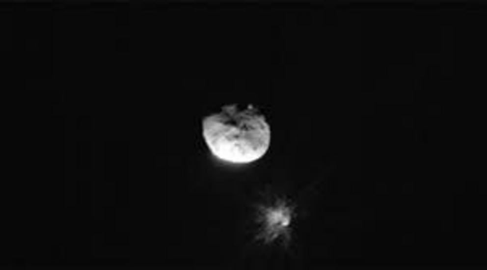 The Italian Space Agency’s LICIACube spacecraft acquired this image just before its closest approach to the Dimorphos asteroid, after the impact. Didymos, Dimorphos, and the plume of debris ejected from Dimorphos are clearly visible.