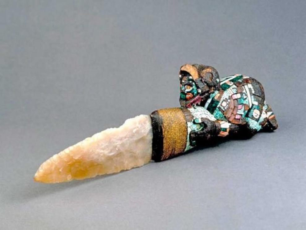 An Aztec knife used for gruesome ritual sacrifices, shaped like a crouching eagle warrior