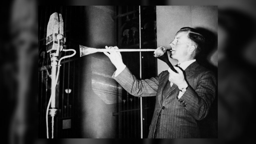 Musician James Tappern, from the British Army, plays a trumpet found in King Tutankhamun's burial in the Egyptian Museum on April 19, 1939.