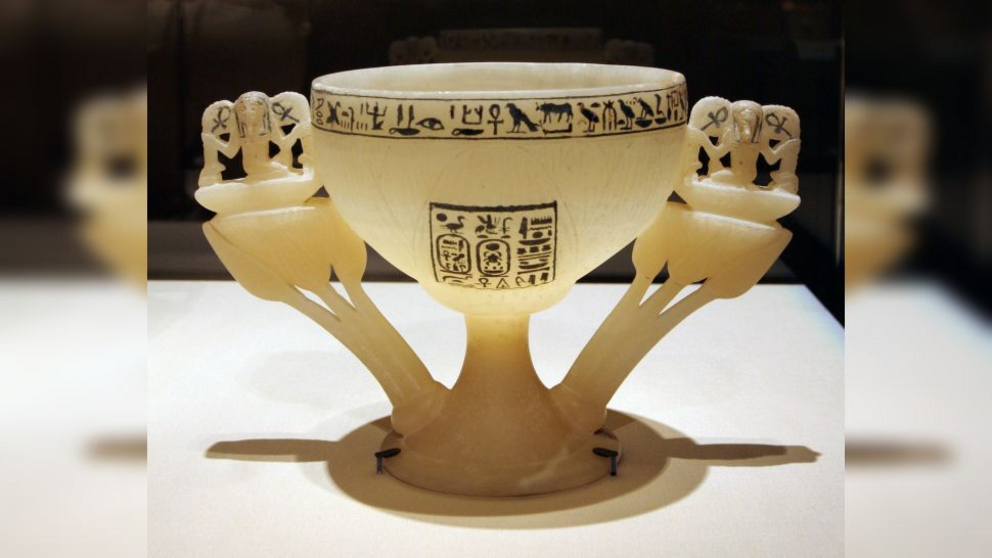 An artistic cup from Tutankhamun's tomb with hieroglyphic text.