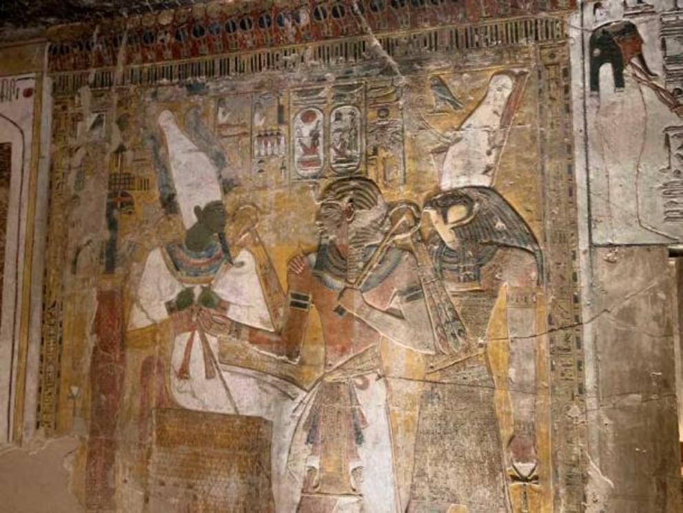 Pharaoh Seti I meets Osiris, in a scene from his tomb, KV 17, in the Valley of the Kings, Thebes, Egypt.