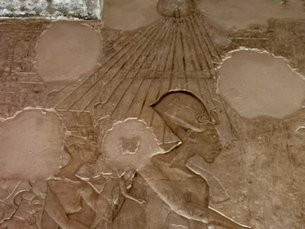 A depiction of Akhenaten, Nefertiti, and their young daughters, from the Tomb of Aye, #25, Amarna, Egypt. Do you notice the ankh sign for “life” being bestowed on the king’s nostrils by the loving hands of the Aten sun disk? An embrace of life (as the kin
