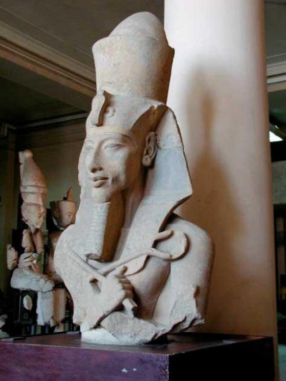 It’s tough to be the pharaoh! Akhenaten had supreme power, but was very controversial. A colossal statue of Akhenaten from his Aten Temple at Karnak, now on display at the Egyptian Museum of Cairo.