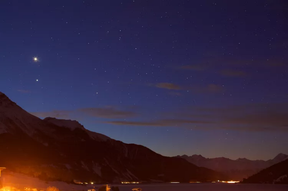 Venus and Jupiter conjunction photographed in Italy.