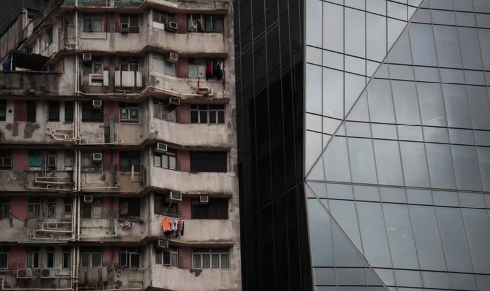 In large apartment buildings neighbours may not know one another. Kin become ancestors; strangers become ghosts. Photograph: Jae C Hong/AP