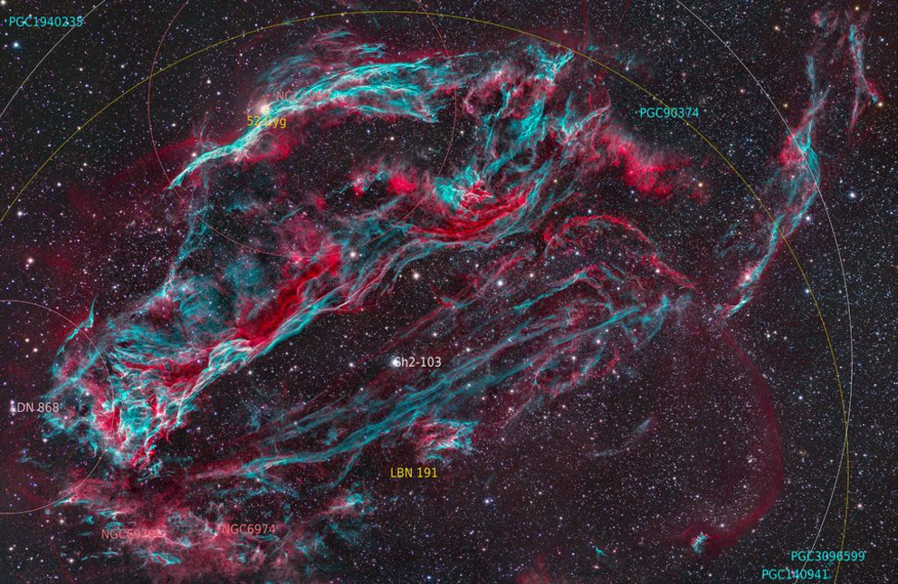 An annotated photo of the Veil Nebula, the Witch's Broom Nebula (NGC 6960) Fleming's Triangular Wisp (NGC 6979), and NGC 6974, a large nebula filament.