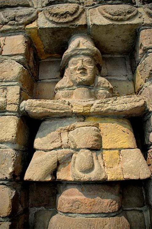 Facade of Inanna Temple at Uruk, Iraq. Female deity pouring life-giving water from a vessel.