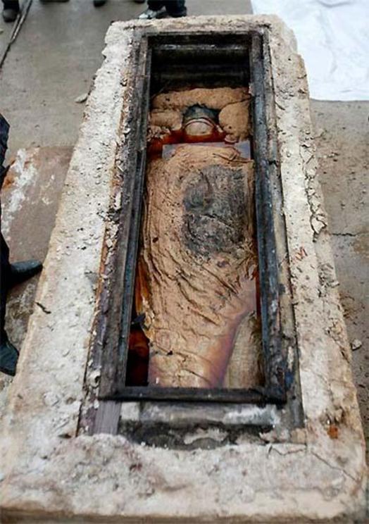 The Taizhou mummy was discovered immersed in a mysterious brown liquid.