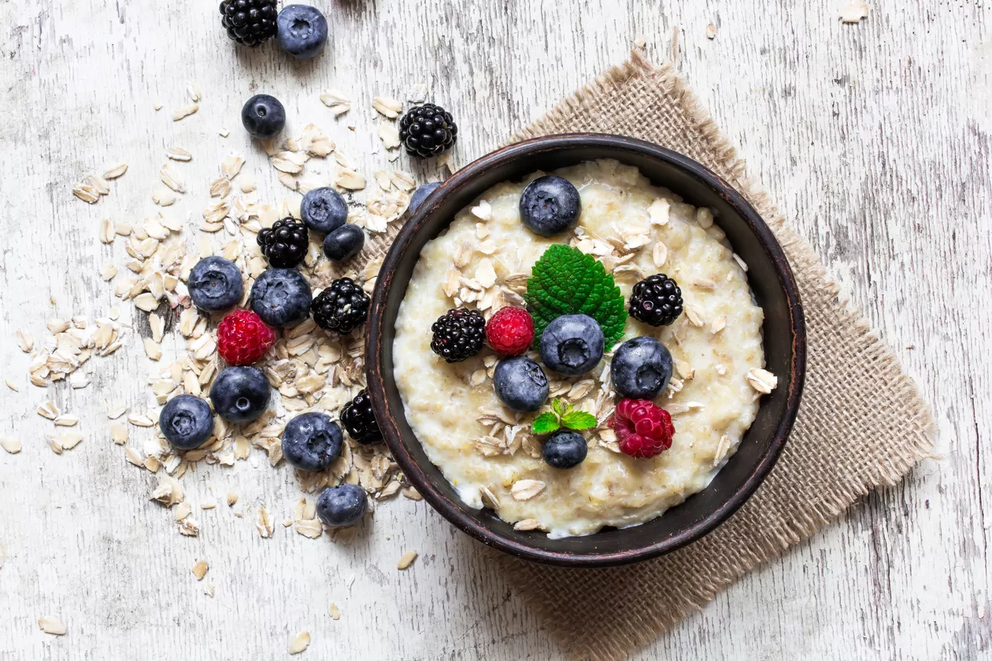 Oatmeal can go the sweet or savory route — either add fruits and a drizzle of honey or top it off with a seasoned egg.