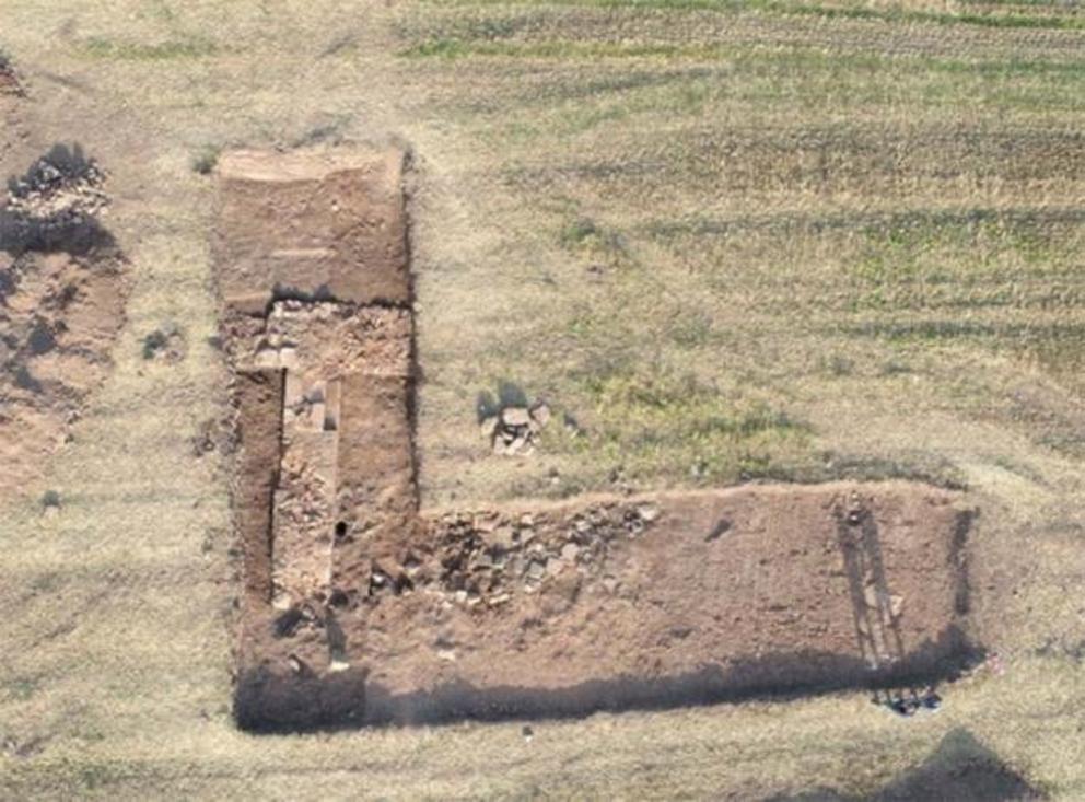 The walls of the palace are emerged at this previous dig.